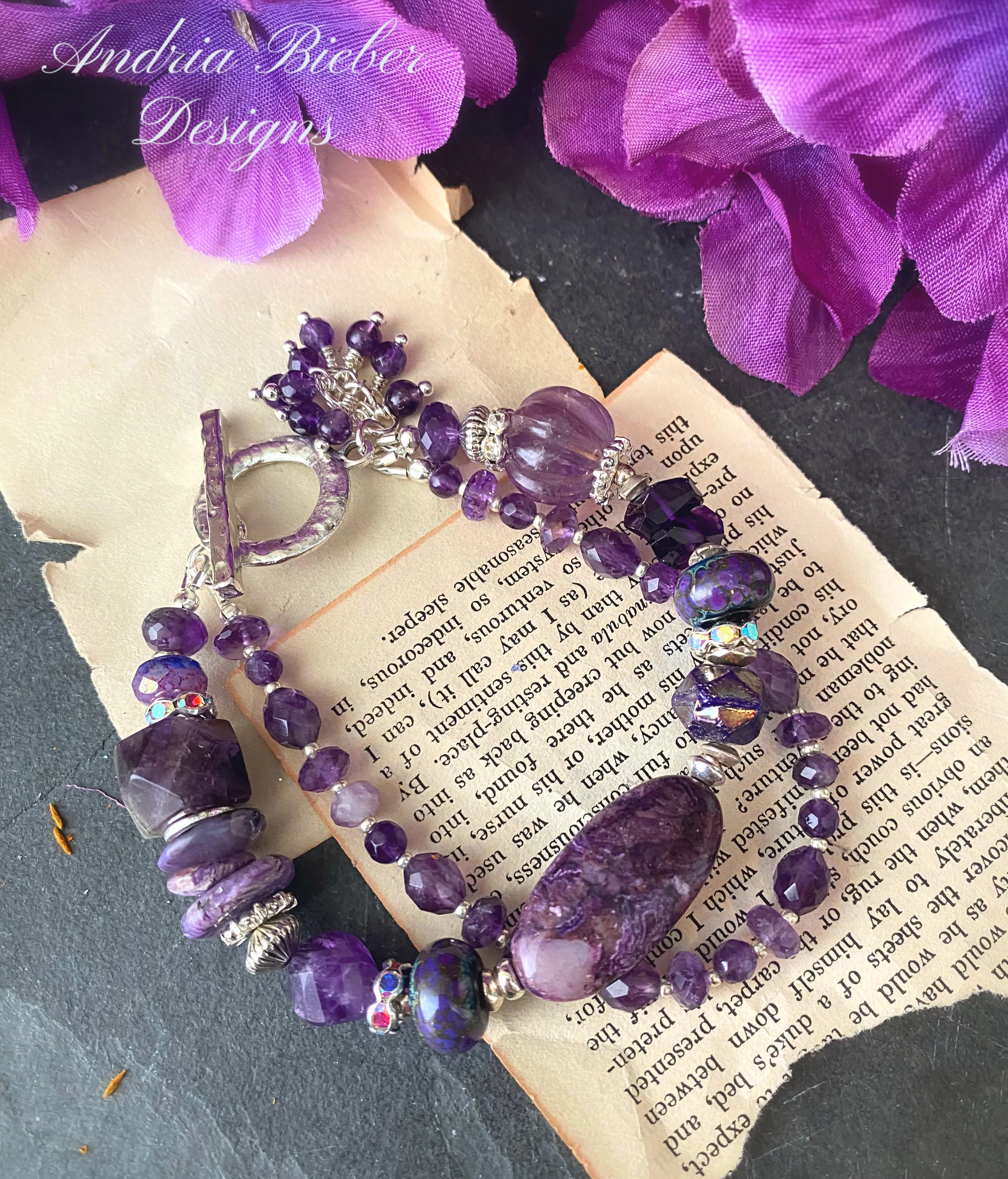 Amethyst gemstone, charoite stone, lampwork glass, silver metal, bracelet.