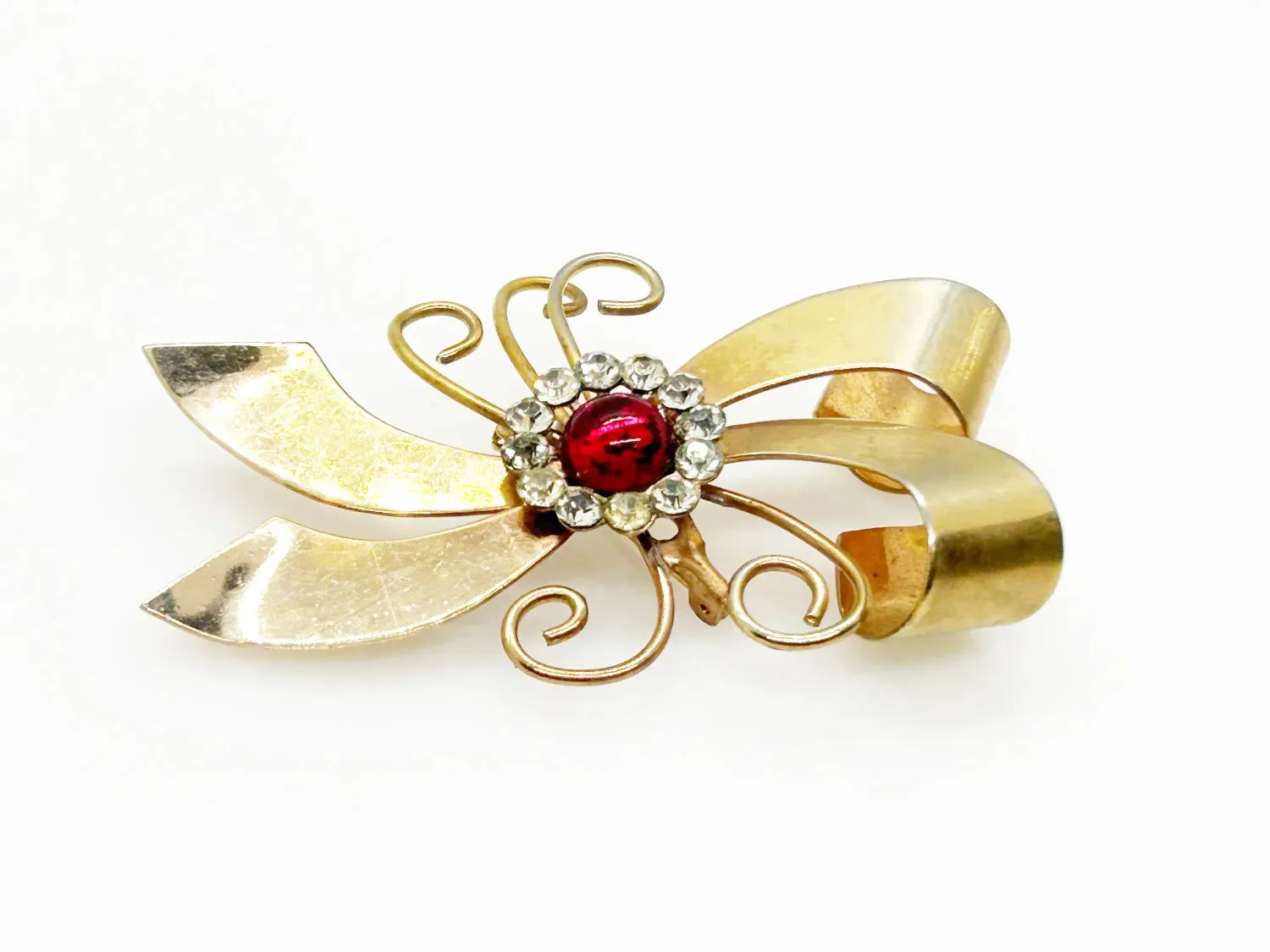 Vintage Abstract Bow Brooch with Red Cabochon and Bright Rhinestones