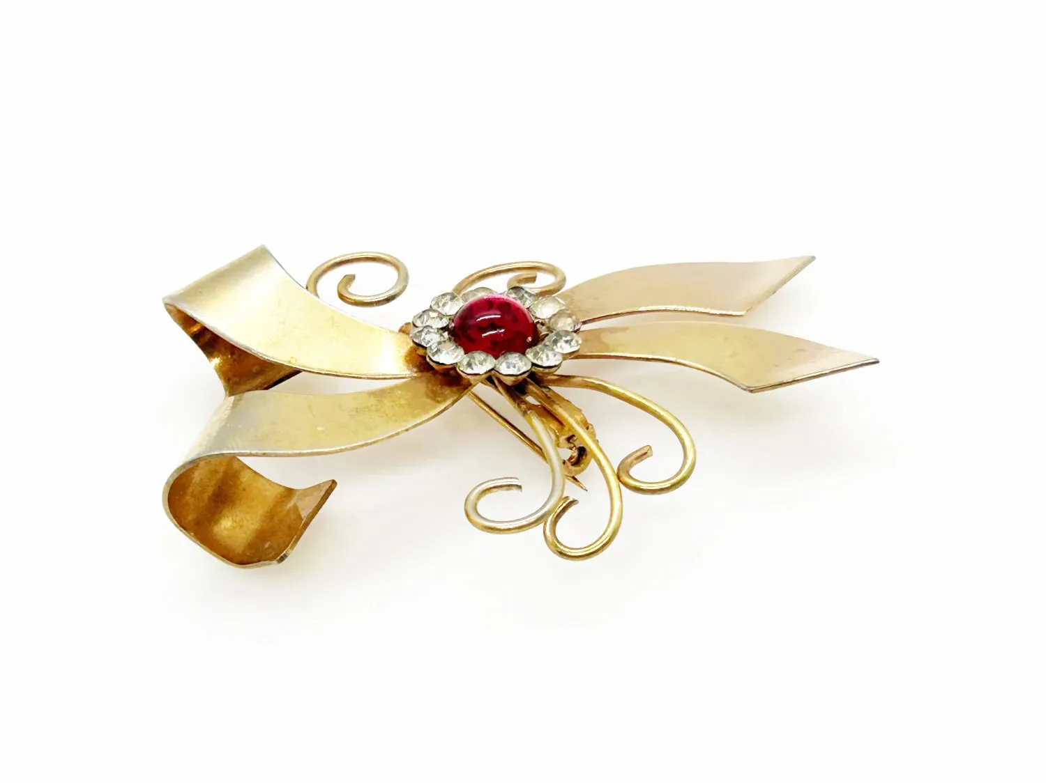 Vintage Abstract Bow Brooch with Red Cabochon and Bright Rhinestones